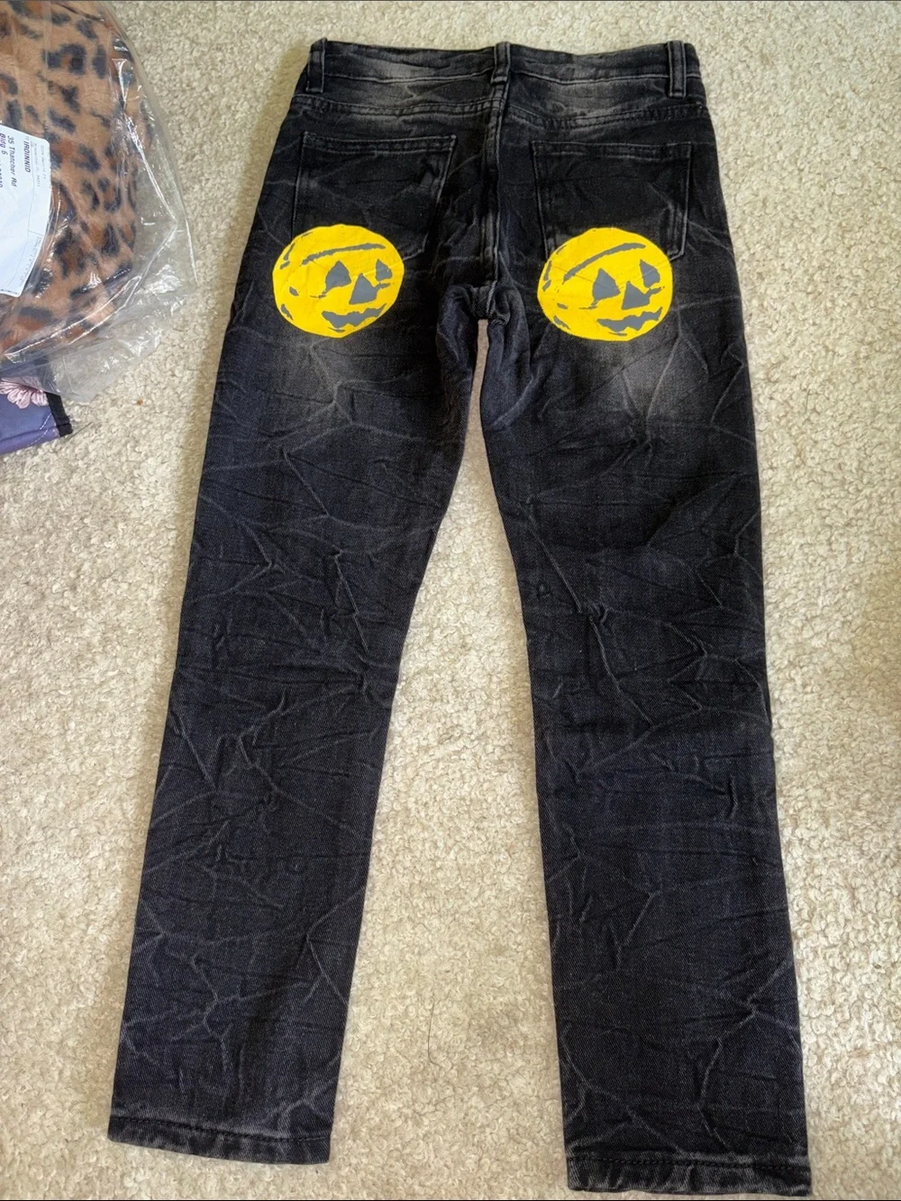 Kids Black Distressed Jeans with Yellow Pumpkin Graphic